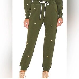 THE GREAT. Dark Green cropped Joggers with gold Heart Accents